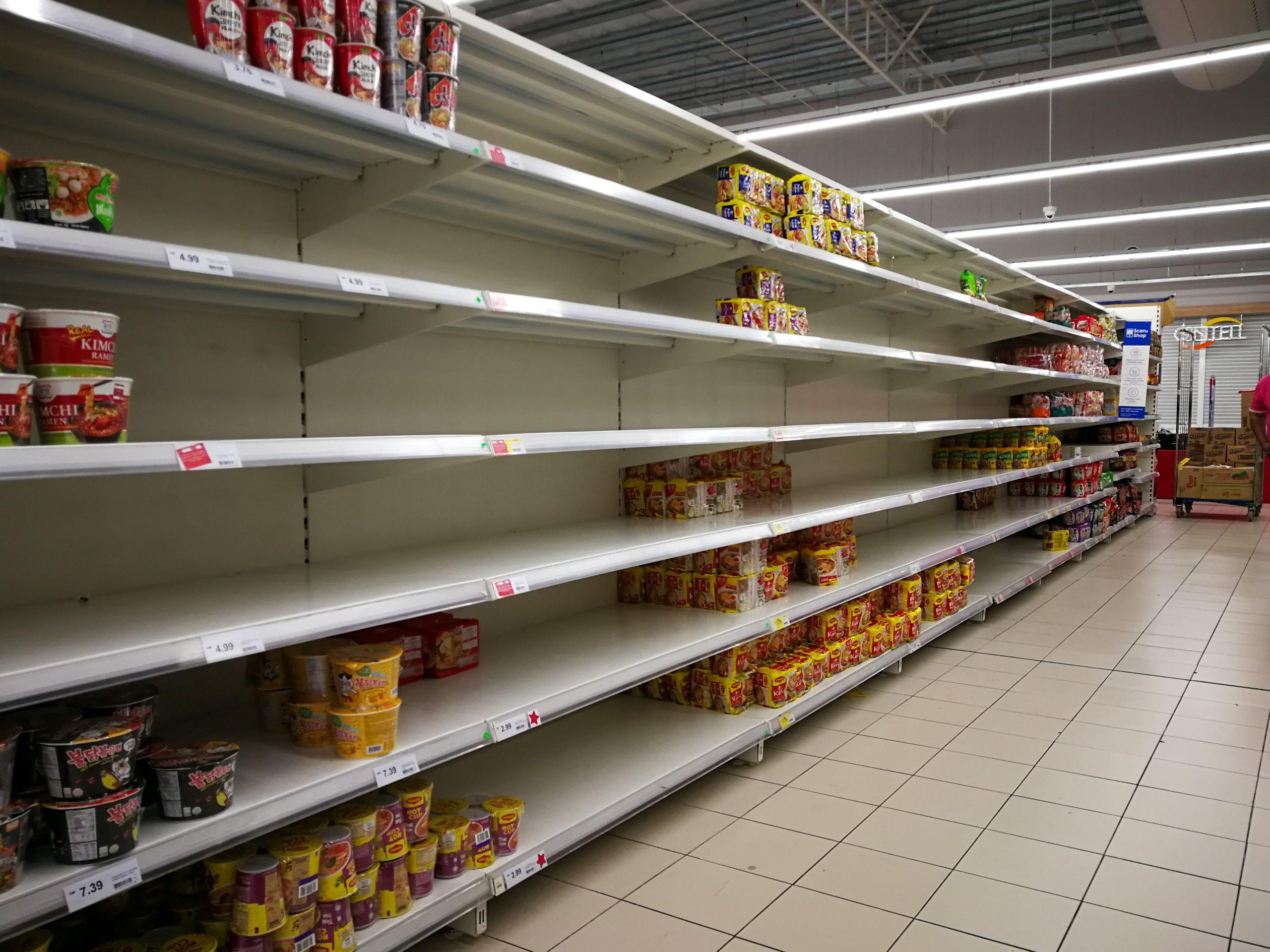 empty shelves at the supermarket hypermarket
